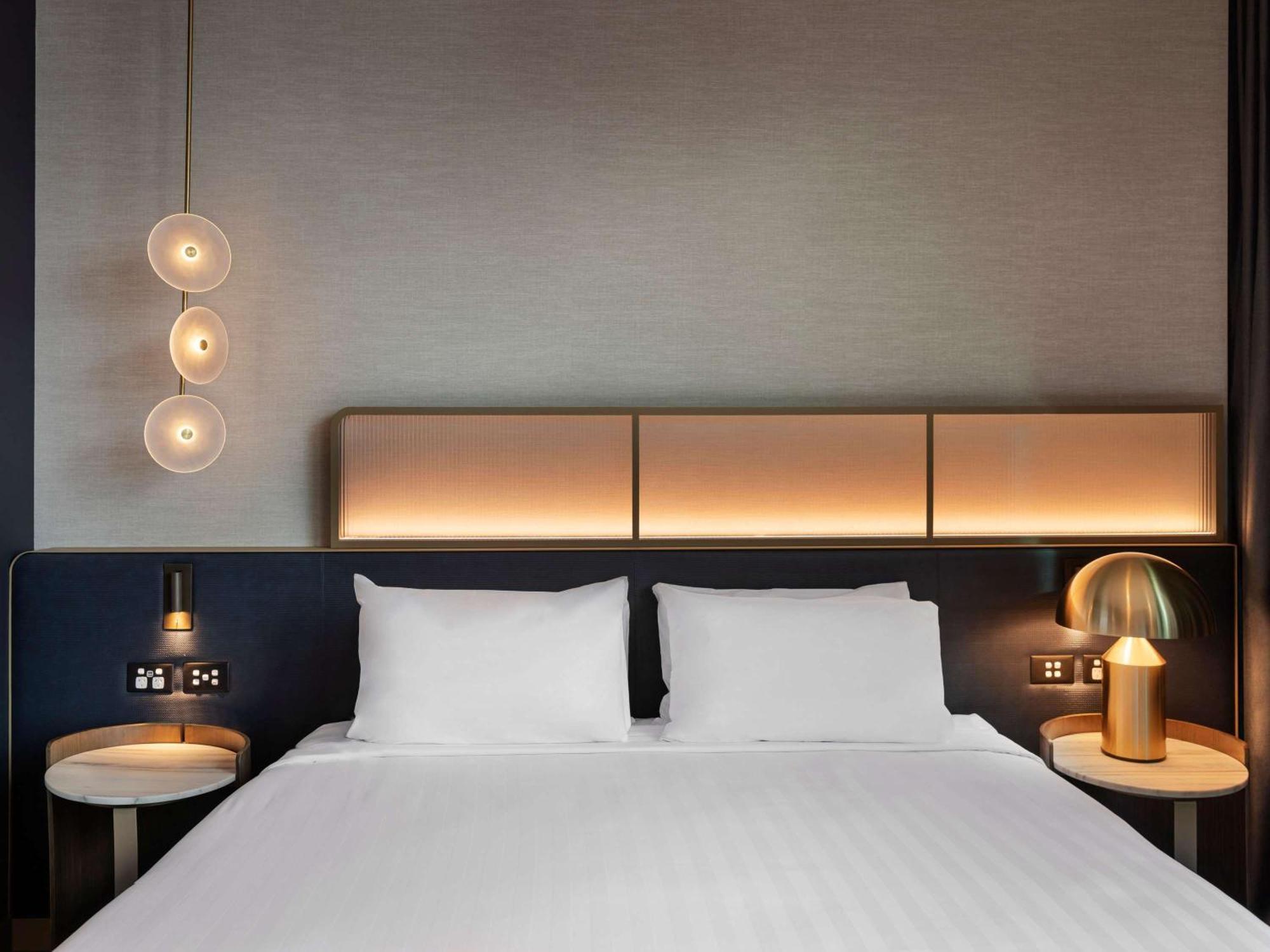 Pullman Auckland Airport Hotel Luaran gambar A bedroom at the hotel